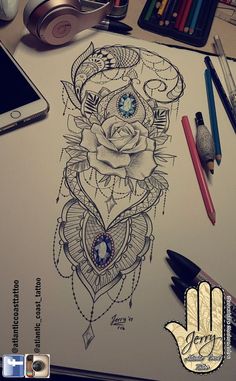 a drawing of a rose with an evil eye on it's face and some other items