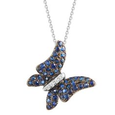 Add a touch of whimsy to your look with this beautiful 14k white gold butterfly necklace. It features a .02 carat sapphire butterfly pendant on a delicate chain. The necklace is perfect for adding a pop of color to any outfit. Elegant Butterfly Gemstone Necklace, Elegant Gemstone Butterfly Necklace, Elegant Blue Necklace With Butterfly Charm, Formal White Gold Butterfly Necklace, Elegant Blue Sterling Silver Butterfly Necklace, Elegant Blue Butterfly Necklace With Charm, Elegant Blue Butterfly Charm Necklace, Gold Butterfly Necklace, Butterfly Necklace Gold