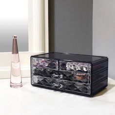 This makeup organizer helps you store and display things to be used. It has four drawers and a top rack. The perfect size to be placed on the tabletop without taking too much space while storing your jewelry, cosmetics, and other accessories. Ikee Design Color: Black | Ikee Design Jewelry & Cosmetic Storage Makeup Accessory Box 7.25 H x 9.37 W x 5.37 D in gray / in Black | 7.25" H X 9.37" W X 5.37" D | Wayfair Makeup Organizer, Cosmetic Storage, Design Jewelry, Organization Help, Black 7, Makeup Organization, Design Color, Makeup Accessories, Too Much