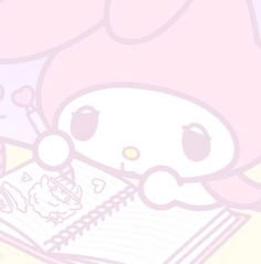 an image of a hello kitty holding a notepad and pen in her hand while looking at it