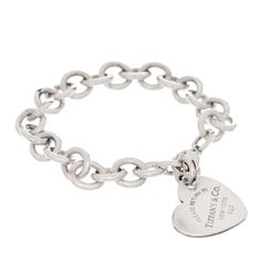 Return To Tiffany Heart Tag Charm Bracelet. 40 Grams. Classic Heart Charm Bracelet For Wedding, Classic Wedding Heart Charm Bracelet, Tiffany Charm Bracelets, Return To Tiffany, Heart Tag, Tiffany Co Jewelry, Tiffany Heart, Tiffany & Co., Womens Jewelry Bracelets