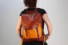 Large leather backpack made of yellow and brown natural leather. Very durable and roomy. Thanks to the bold colors, simple design and universal size, you can use it both for traveling and everyday. Perfect for a girl and a boy, for school, work and shopping. Capacity and additional pockets will provide you with comfort in every situation. Handmade Leather Backpack For Everyday, Everyday Handmade Brown Backpack, Everyday Handmade Satchel Backpack, Everyday Handmade Leather Backpack, Handmade Brown Backpack For Everyday, Yellow Leather School Bag, Yellow Leather Backpack For School, Yellow Leather School Backpack, Yellow Leather Backpack For Everyday Use