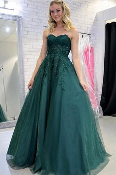 Capture attention in this stunning Green A-Line Strapless Sweetheart Appliques Tulle Long Prom Dress. The flattering A-Line silhouette and strapless, sweetheart neckline highlight your figure while delicate appliques and elegant tulle add a touch of femininity. Stand out in this beautiful dress perfect for prom or any special occasion. Prom Dresses Dark Green, Green Long Prom Dress, Prom Dress Green, Tulle Long Prom Dress, Strapless Evening Dress, Green Tulle, Ball Gowns Princess, A Line Evening Dress, A Line Prom Dresses