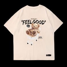 Feel Good T Shirt - Graphic Print Tee for Men Add a playful twist to your wardrobe with the Feel Good T Shirt, designed for men who love casual yet stylish streetwear. This hip-hop inspired tee features a fun toy bear shopping cart graphic, making it a standout piece in any collection. Made from breathable cotton, the feel good t shirt is perfect for spring, summer, and autumn, offering all-day comfort whether you’re out skateboarding or relaxing with friends. With its short sleeves and classic Cheap Printed T-shirt For Streetwear, Cheap All Over Print T-shirt For Streetwear, Black Graphic Print T-shirt For Streetwear, Casual Bear Print T-shirt For Streetwear, Black And Khaki, Bear Design Graphic Tee Short Sleeve T-shirt, Printed Casual Dresses, Streetwear Tops, Mens Khakis