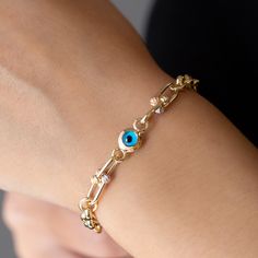 14K Yellow Gold Evil Eye Bracelet, Real Classic Glass Evil Eye, 14K Solid Gold Protection Bracelet, 14k Gold Protection Charm Bracelet *Free Express International Shipping NEXT BUSINESS DAY SHIPPING! PRODUCT DETAILS *The product is made of 100% 14k Solid Gold and it has a 14K or 585 stamp on item. (We don't sell filled or plated jewelry) *The package includes a gold certificate.  *Every package comes in a gift box. *14K gold indicates that the product is produced from 58% pure gold. *The product is yellow gold. *Charm Dimensions(Evil Eye): 7.00 mm ball shape *Evil eye provides an invisible protection for user in some beliefs.  *The chain on the bracelet is a snake model and has 2.50 mm width. *       Made in Türkiye. BRACELET SIZE CHART *XS- 6 inches (15.50cm) *S -   6.50 inches (16.50cm) Gold Evil Eye Bracelet, Gold Certificate, Bracelet Size Chart, Gold Armband, Snake Necklace, Protection Bracelet, Gold Snake, Eye Bracelet, Exclusive Gift