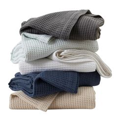 folded towels stacked on top of each other