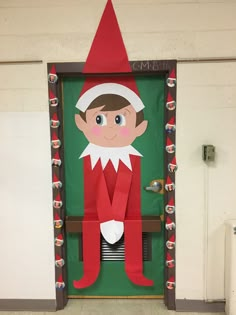 an elf door decoration made to look like he is sitting on a bench