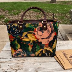 This Is A Patricia Nash Brindley Tote In Winter Bloom. It Is Floral Leather With A Western Flair And A Structured Style. Patricia Nash Bags Are Well Made. This Is A Brand New, Never Used Bag With Tags. Includes Original Dust Bag. The Bag Measures 10 In At Bottom Of Bag ..But 12 In At Top Opening. It Is 9 In In Height And 3 1/2 In Wide.The Handles Have A 8 1/2 In Drop. It Has Interior Zipper Pocket And Open Slip Pockets. Multicolor Coated Canvas Shoulder Bag With Dust Bag, Multicolor Top Handle Coated Canvas Shoulder Bag, Multicolor Coated Canvas Top Handle Shoulder Bag, Designer Multicolor Bags For Everyday Use, Multicolor Coated Canvas Bag With Double Handle, Multicolor Rectangular Satchel With Dust Bag, Designer Multicolor Box Bag For Daily Use, Multicolor Coated Canvas Satchel Bag, Luxury Multicolor Box Bag With Detachable Handle