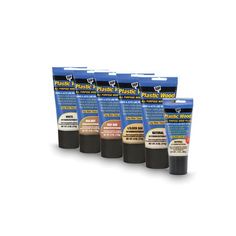 four different colors of acrylic paint are shown in the package, including black and white