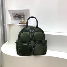 Brand Name: MR.YLLSPlace Of Origin: GUANG DONG ProvinceOrigin: CN(Origin)Main Material: NylonCapacity: Below 20 LitreItem Type: BackpacksStyle: FashionClosure Type: zipperTechnics: EmbossingExterior: Silt PocketRain Cover: NoGender: WOMENCarrying System: TCSLining Material: PolyesterPattern Type: SolidDecoration: NONEBackpacks Type: SoftbackInterior: Interior Zipper PocketHandle/Strap Type: Soft Handle Small School Bags, Backpacks For Women, Line Texture, Luggage Sizes, Stitch Lines, Student Bag, Trend Style, Rain Cover, Green Bag