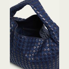 Bottega Veneta "Hop" hobo bag in denim intrecciato cotton and leather  Shoulder strap  Fold-over flap top with  Interior, one zip pocket  Approx. 9.4"H x 21.2"W x 5.1"D Made in Italy Blue Leather Shoulder Bag With Woven Detail, Blue Woven Leather Top Handle Shoulder Bag, Intrecciato Weave Hobo Shoulder Bag For On-the-go, Designer Blue Shoulder Bag With Braided Handles, Designer Blue Shoulder Bag With Woven Leather, Designer Blue Woven Leather Shoulder Bag, Casual Top Handle Shoulder Bag With Intrecciato Weave, Casual Shoulder Bag With Intrecciato Weave And Top Handle, Casual Shoulder Bag With Top Handle Intrecciato Weave