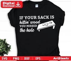 a black shirt that says if your sack is hittin wood you missed the hole