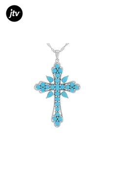 Beautiful Faith��
5x3mm oval and pear shape with 3mm round Sleeping Beauty turquoise rhodium over sterling silver Beautiful Faith��� cross pendant with 18" singapore chain. Measures approximately 1 15/16"L x 1 1/8"W. 1.5mm bail. Lobster claw clasp with 2" extender. Turquoise Sterling Silver Cross Pendant, Turquoise Sterling Silver Cross Pendant Jewelry, Elegant Turquoise Cross Jewelry, Sterling Silver Cross Pendant, Silver Cross Pendant, Pendant With Chain, Sleeping Beauty Turquoise, Sterling Silver Cross, Silver Cross