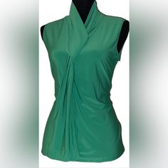 A Stunning Petite Xlp Tiffany & Grey Sleeveless Blouse. Brand New With Tag, It's (95% Polyester And 5% Spandex Blend). It’s Great With Your Favorite Jeans Or Dress It Up With A Chic Skirt For A Versatile Look That's Sure To Turn Heads. Step Into The Season With Confidence! Elegant Green Tank Top, Elegant Green Stretch Tank Top, Fitted Green Tank Blouse, Elegant Green Vest Top, Green Stretch Sleeveless Blouse, Chic Green Blouse With Vest Detail, Chic Green Tank Blouse, Green Sleeveless Blouse Tank Top, Green Sleeveless Blouse