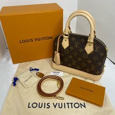 Used Once. Very Good Condition. Close To Rank Sa. Complete Inclusion:Box, Dust Bag, Ribbon, Clochette, Padlock With Dustbag And Key And Strap. Hardware Is Super Gold. No Visible Usage. Interior Is Clean And No Foul Smell. Beige Monogram Canvas Bag For Evening, Classic Cream Monogram Canvas Bag, Luxury Cream Monogram Canvas Bag, Black Alma Bb, Louis Vuitton Neo Alma Bb, Alma Bb Monogram, Alma Bb Damier Azur, Alma Bb Louis Vuitton Black, Lv Alma Bb Monogram