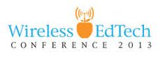 the logo for wireless edtech conference 2013, with an orange carrot in the center