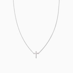 It’s not a T necklace, it’s our Simple Cross Necklace. Featuring a dainty, simple chain necklace and a pavé cross, this is the necklace your everyday look has been missing. Want to know the best part? Not only does this cross necklace come in gold, but you can also get it in Sterling Silver. Minimalist Clavicle Chain Necklace With Cross Pendant, Everyday Cross Pendant Clavicle Necklace, Everyday Clavicle Chain Necklace With Cross Pendant, Minimalist Cross Chain Necklace With Delicate Chain, Minimalist Delicate Chain Cross Necklace, Dainty Cross Necklace For Everyday Wear, Minimalist Cross Pendant Necklace For Everyday, Minimalist Cross Pendant Necklace For Everyday Wear, Dainty Everyday Cross Necklace With Delicate Chain