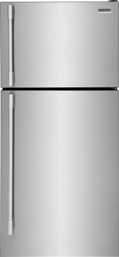 a silver refrigerator freezer sitting next to a white wall and door handle on the left side