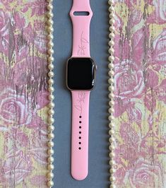 *Your engraved Apple Watch Band is handmade and therefore unique and one of a kind! *Color in photos: Pink *Watch Size: Compatible with 38mm, 40mm, 41mm, 42mm, 44mm, 45mm watch sizes. *Watch Band Lengths: 38/40/41mm - Small/Medium fits wrist circumference 5.1-7.1 inches (130-180 mm) - Medium/Large fits wrist circumference 5.9-7.9 inches (150-200 mm) 42/44/45mm - Small/Medium fits wrist circumference 5.5-7.3 inches (140-185 mm) - Medium/Large fits wrist circumference 6.3-8.3 inches (160-210 mm) * Handmade Pink Watch Bands As Gift, Personalized Pink Watch Accessories For Gift, Personalized Pink Watch Accessories Gift, Personalized Pink Apple Watch Band For Gift, Personalized Pink Apple Watch Band As Gift, Rose Watch, Best Apple Watch, Apple Band, White Hibiscus