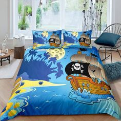 a bed with pirate themed sheets and pillows