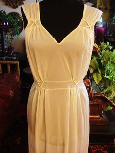 Vintage 1990s Maxi Delicate Blush Yellow Lingerie Night Gown, Fitted Waistline, Nylon, By Luxite, Sleeveless, Romantic, Effortless as well as timeless, SIZE 36, Good Vintage Condition, Clean. Vintage Style Summer Night Slip Dress, Cream Sleeveless Nightgown, Sheer Fitted Sleeveless Nightgown, Fitted Sleeveless Evening Nightgown, Vintage Sleeveless Slip Dress For Wedding Night, Stretch Sleeveless Nightgown For Daywear, Sleeveless Summer Evening Nightgown, Cream Sleeveless Sheer Sleepwear, Fitted Sleeveless Vintage Nightgown