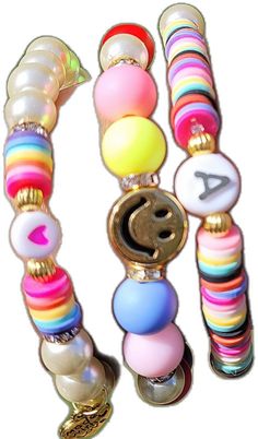 Cheerful Multicolor Adjustable Friendship Bracelets, Cheerful Adjustable Multicolor Friendship Bracelets, Personalized Multicolor Round Beaded Bracelets, Cheerful Multicolor Jewelry For Friendship, Cheerful Beaded Adjustable Friendship Bracelets, Cheerful Letter Beads Bracelets As Gift, Cheerful Letter Beads Bracelet As Gift, Cheerful Beaded Bracelets With Letter Beads As Gift, Adjustable Multicolor Charm Bracelet With Heart Beads