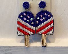 Red, white and blue beaded popsicle earrings just perfect for your summer celebrations! Wear them to picnics and outdoor events or on a starry night date with your favorite top and jeans. These earrings are fun and sassy. Length 3” Width 1” Casual Handmade Beaded Earrings For Summer, Trendy Blue Beaded Earrings For Summer, Fun Beaded Earrings For Summer, Casual Beaded Earrings For Summer Parties, Casual Summer Party Beaded Earrings, Casual Summer Beaded Earrings With Colorful Beads, Trendy Summer Beaded Earrings, Casual Summer Party Earrings, Summer Party Beaded Earrings