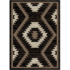 a black and white rug with an abstract design