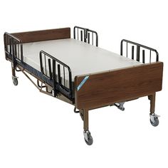 a hospital bed with wheels and mattresses on it's sides, against a white background