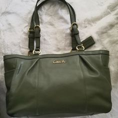 Authentic Coach,Leather, Olive Green Shoulder Bag. Very Beautiful Rich Color. Gold Hardware, Adjustable Shoulder Straps, 1 Large Pocket On Back, 3 Interior Pockets, Dark Chocolate Interior Lining, Logo Tag Attached, And Two Pockets On Each Side. Approx. Measurements- 11.5 W, 9 L, 4.5d, 9.5 Stap Drop. Never Used, Carefully Stored. A True Vintage Item. Ship To Usa Address Only. No Po Box. Coach Double Handle Shoulder Bag With Leather Lining, Coach Shoulder Bag With Leather Lining For Shopping, Coach Leather Bag With Soft Leather, Chic Coach Leather Bag, Coach Shoulder Bag With Leather Lining And Double Handle, Coach Leather Shoulder Bag With Double Handle, Coach Leather Shoulder Bag With Handles, Coach Satchel With Leather Handles For Office, Coach Leather Shoulder Bag For Shopping