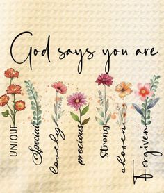 the words god says you are surrounded by flowers on a white paper towel with black writing