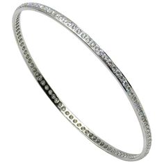 18KT White Gold Diamonds Garavelli Bangle BRACELET One row of white diamonds. 18kt GOLD gr : 12,00 WHITE DIAMONDS ct : 2,72 Classic Diamond Pave Bangle Bracelet, Dazzling Diamond Bangle Bracelet With Pave Setting, 17 Jewels Bangle Diamond Bracelet For Anniversary, Sterling Silver Bracelet With Pave Diamond Setting, Silver Diamond Bracelet With Pave Setting, Diamond White Diamond Bangle With Pave Setting, Classic Gold Bangle Bracelet With Pave Setting, Diamond White Sterling Silver Bracelet With Pave Setting, Modern White Gold Diamond Bracelet With Accents