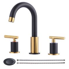 two faucets with black handles and gold accents