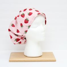 Are you feeling the summer vibes yet?  This scrub hat is sure to spread the summer feelings to all your co-workers!  Chose a hat that brings the feeling of sunshine and smiles, reflects your unique personality and puts some fun back in your busy day.  This is an exceptionally comfortable, European style scrub hat, in fun, fresh strawberry fabric.    The perfect, stylish addition to your work gear or a great gift for the dedicated healthcare worker in your life.  These hats are sure to bring a smile, brightening a long work day.   Each hat is easily adjustable and  gentle on sensitive ears with a discreet toggle that tucks into the hat during wear. Made from durable yet cool fabric that will hold up to repeated washing    This hat accommodates any hair style with room to tuck in a ponytail Cute Cotton Hat, Cute Cotton Hat One Size, Cute Cotton Hat, One Size Fits All, Cute One Size Cotton Hats, Adjustable Cotton Bucket Hat One Size, Summer Adjustable Beanie Hat, Cute Adjustable Hats For Everyday, Cute Adjustable Hats, Adjustable Fun Style Cotton Bucket Hat