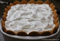 a cake with white frosting in a bowl