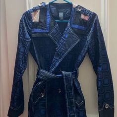 Designer Blue Jacket With Sequin Embroidery On Shoulders. Button And Tie At Waist. Great Quality And Minimal Usage. Size 40 In Europe Which Is Small Designer Blue Blazer With Button Closure, Formal Blue Outerwear With Snap Buttons, Fitted Blue Outerwear With Covered Buttons, Blue Double-breasted Outerwear With Snap Buttons, Blue Button-up Outerwear With Double Button Closure, Fitted Blue Button-up Outerwear, Blue Double-breasted Outerwear With Button Closure, Winter Blue Blazer With Snap Buttons, Designer Blue Outerwear With Button Closure