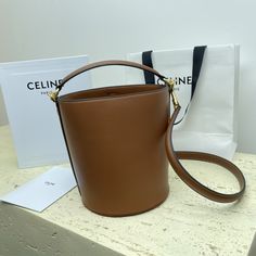 TEEN BUCKET mini 16 smooth cow leather bucket bag
6 X 7 X 6 inches (16 X 18 X 16 cm)
Smooth calfskin
Lining: Cow leather
Turnlock closure
1 main compartment
Detachable leather shoulder strap 19 inches (47 cm) long
Leather handles are 2 inches (5 cm) long Bucket Mini, Lv Purse, Lv Shoes, Lv Belt, Lv Handbags, Lv Wallet, Leather Bucket Bag, Leather Bucket, Purple Bags