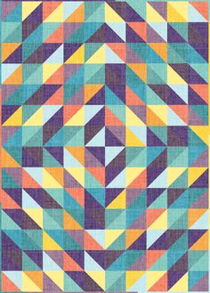 an image of a colorful quilt with many different colors and shapes on it's sides