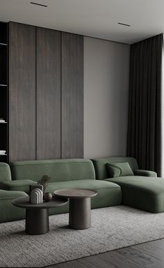 a living room filled with furniture next to a large wall mounted book shelf and window