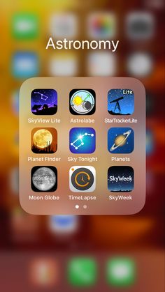 an iphone screen showing the astronomy app on it's display, with other icons