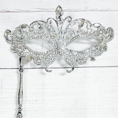 Durable Quality: This Crystal Masquerade Mask With Metal Stick Is Made Of High-Quality Alloy And Rhinestone, Diamond. They Are Manual Workmanship, Very Comfortable To Wear. Elegant Design: The Masquerade Mask Is Encrusted Shinny Diamond Rhinestone And Crystal. The Intricate And Delicate Are Very Glamorous, Elegant And Luxury. Princess Style: You Will Be The Center Of Attraction At Party When You Wear The Princess Style Fancy Mask. Various Occasion: The Masks Are Perfect For Masquerade Party, Fes Hand Held Masquerade Mask, Masquerade Mask With Stick, Mask Prom, Fancy Mask, Silver Masquerade Mask, Crystal Mask, Silver Mask, Carnival Themed Party, Silver Swan