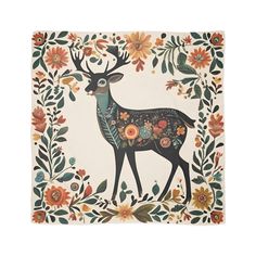 a decorative wall hanging with a deer and flowers on it