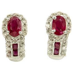 Small diamond and ruby white gold hoop type earrings featuring an oval ruby set in a diamond frame with a hopples area with channel set square rubies with three diamonds on either side. The earrings are 18k white gold and the backs are 14k white gold. These earrings have posts. Ruby Set, White Gold Hoops, Diamond Frame, White Gold Earrings, Channel Set, Ruby Diamond, Accessories Jewelry Earrings, Cornice, Jewelry Earrings Hoops