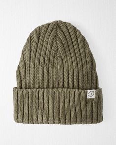 This ribbed knit cap couldn't be more versatile in a style that lasts from fall through winter. In a neutral olive, this hat pairs well with everything in our little planet and in ribbed organic cotton, it's soft and stretchy too. This knit style folds up for the perfect fit and is made to grow with your little one. Crafted in the purest organic fabrics and sustainable materials, Little Planet is a return to simplicity. Thoughtful essentials and timeless pieces to gift or to hold on to. Infant Winter Hats, Baby Boy Beanies, Ribbed Knit Beanie, Boys Beanie, Holiday Pjs, Newborn Beanie, Neutral Accessories, Carters Baby, Knit Cap