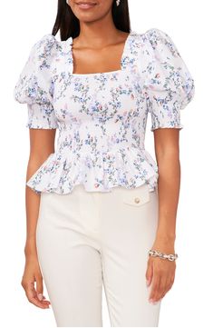 Comfortable, stretchy smocking perfects the slim fit of this flower-strewn cotton poplin top finished with a face-framing neckline and a softly ruffled peplum. Square neck Short sleeves 100% cotton Machine wash, line dry Imported Fitted Floral Print Cotton Smocked Top, Cotton Square Neck Blouse With Floral Print, Cotton Blouse With Floral Print And Square Neck, Spring Floral Print Smocked Top With Puff Sleeves, Feminine Cotton Smocked Top For Spring, Feminine Smocked Top With Puff Sleeves And Floral Print, Feminine Floral Print Smocked Top With Puff Sleeves, Fitted Smocked Top With Ruched Square Neck, Chic Floral Print Smocked Top For Spring