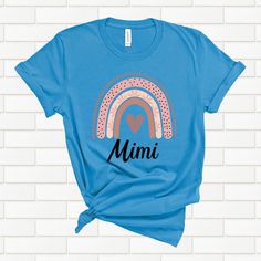 "Fall in love with these soft & comfy Bella Canvas t-shirts that are sure to be your new \"must have more\" shirts! Mimi tshirt, Mimi shirt, Mimi tee, Mother's Day shirt, Mothers Day tshirt, Nana tshirt, Nana shirt, Womens shirt, Gift for her, Gift for gram, Womens shirt, Grandmother shirt Recommendations: *For a standard fit, stick with your typical size *For an oversized fit, size up *For a fitted shirt, size down. *Shirts are longer. Great for knots, Tucks, or nice coverage with leggings. *Unisex Cut. works great for Everyone! Women sizes: Small: 2-4 | Medium: 6-8 | Large: 10-12 | XL: 14-16 | 2XL: 18-20 | 3XL: 22-24 | 4XL: 26-28 Men sizes: Select your standard size. Details: *Soft, Breathable, & very comfy Bella + Canvas *Pre-shrunk fabric *Solid Colors: 100% combed and ring-spun cotton Cute Blue T-shirt For Gift, Cute Mother's Day T-shirt, Cute Relaxed Fit T-shirt For Gift, Nana Shirts, Fitted Shirt, Grandmother Gifts, Womens Shirt, Mothers Day Shirts, Bella Canvas