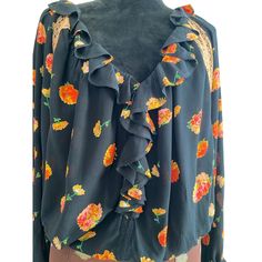 Romantic Black Floral, Blouse, Ruffle Front And Cuffs, Billowy Ballon Long Sleeves ,Peach Lace Inset On V Neck Front And Back And Sides .Pullover Mesh Bottom Snap In Body Suit. Cotton / Poly Blend. Nylon Lace. Machine Wash. Line Dry . Size Small, Cottage Core Vibe. Clean And Ready To Wear.Nwt. Orange V-neck Blouse With Ruffles, Peach Lace, Black Floral Blouse, Small Cottage, Lace Inset, Lace Ruffle, Body Suit, Floral Blouse, Long Sleeve Lace