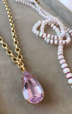 18k gold large Kunzite necklace by fine jewelry designer Goshwara. 18 karat yellow gold 45.50 carats Kunzite gemstone Stone Size: 33 x 17 mm 18 inches thick gold chain (maximum length) Chain can be hooked at different length Estimated Delivery7 working days Customs Duties & Taxes may apply. Shipped from USA Kunzite Necklace, Kunzite Jewelry, Thick Gold Chain, Contemporary Fine Jewelry, 18k Gold Chain, Unique Necklace, Fine Jewelry Designers, Jewelry Designer, Precious Jewelry