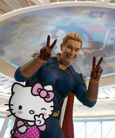 a man in a hello kitty suit holding up two fingers and making the peace sign