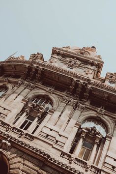 an old building with many windows on it